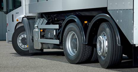 Steered leading and trailing axles